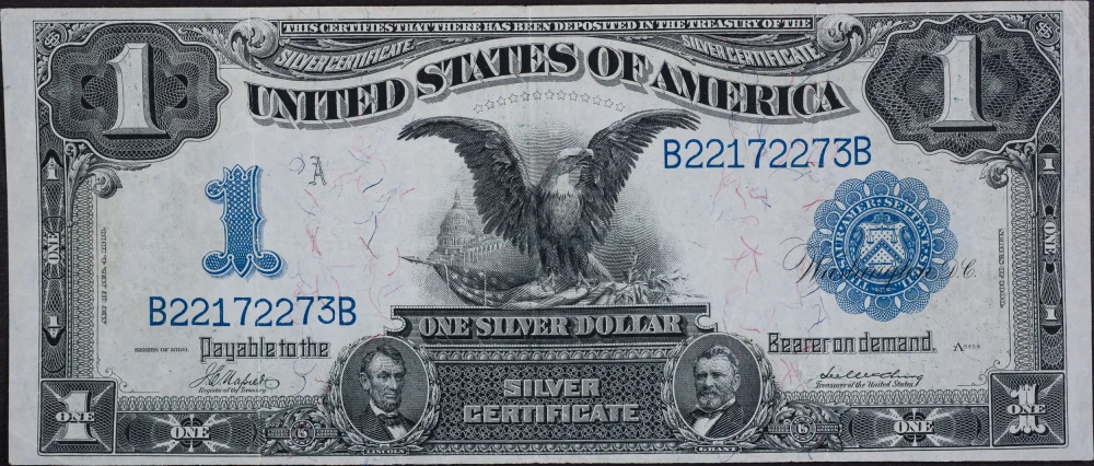 EF-AU-45+ 1899 $1 Black Eagle