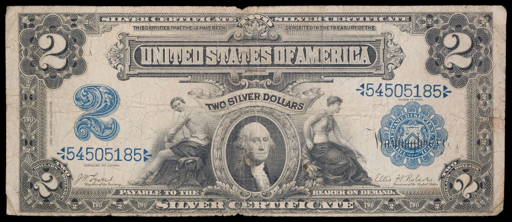 VG to Fine Series 1899 $2 Silver Dollar Note