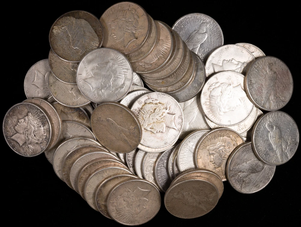 61 Pcs Ave. Circulated Peace Dollars