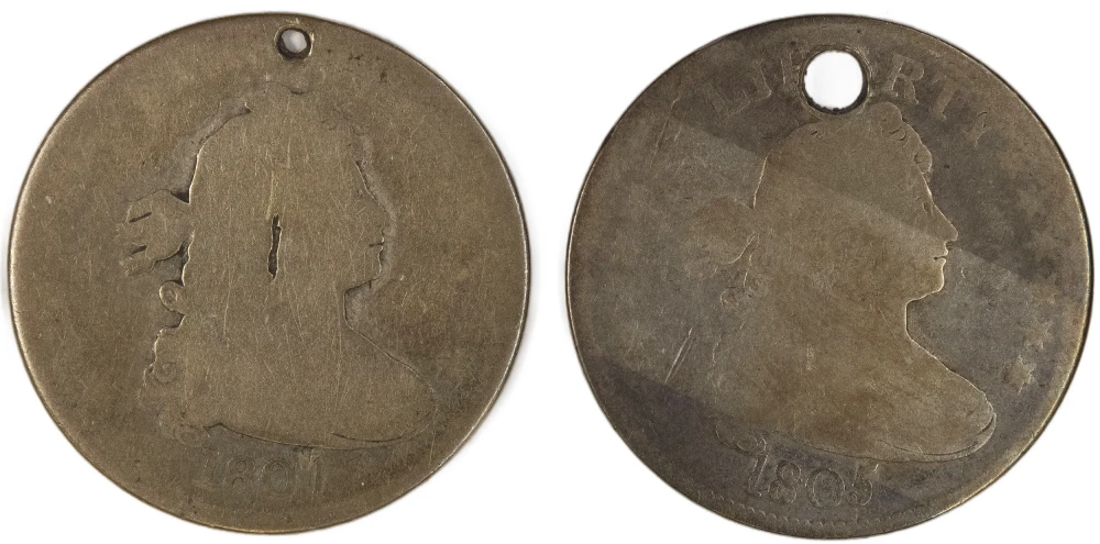 Pair Of Holed Bust Quarters