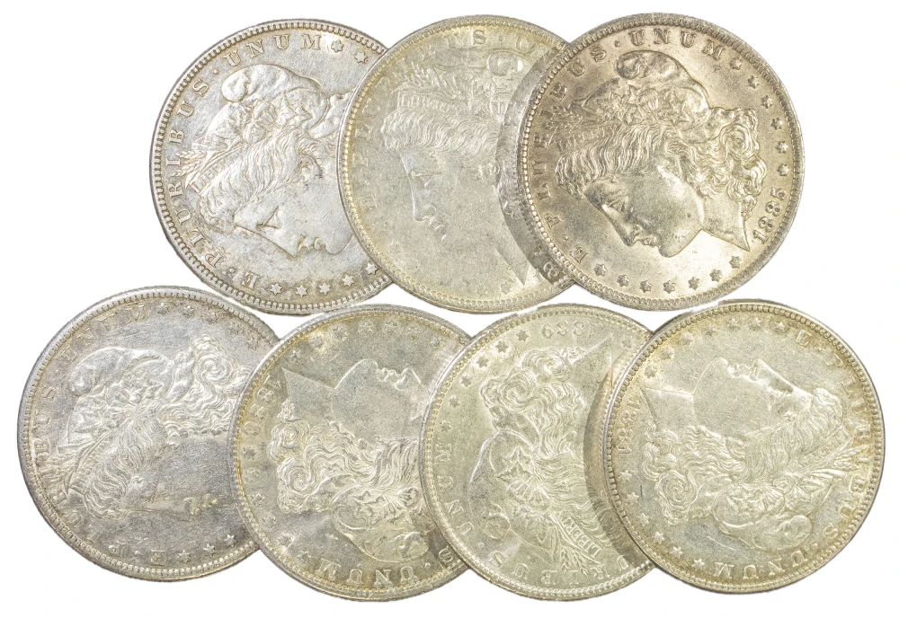 7 Pieces AU Pre-21 Morgan Dollars