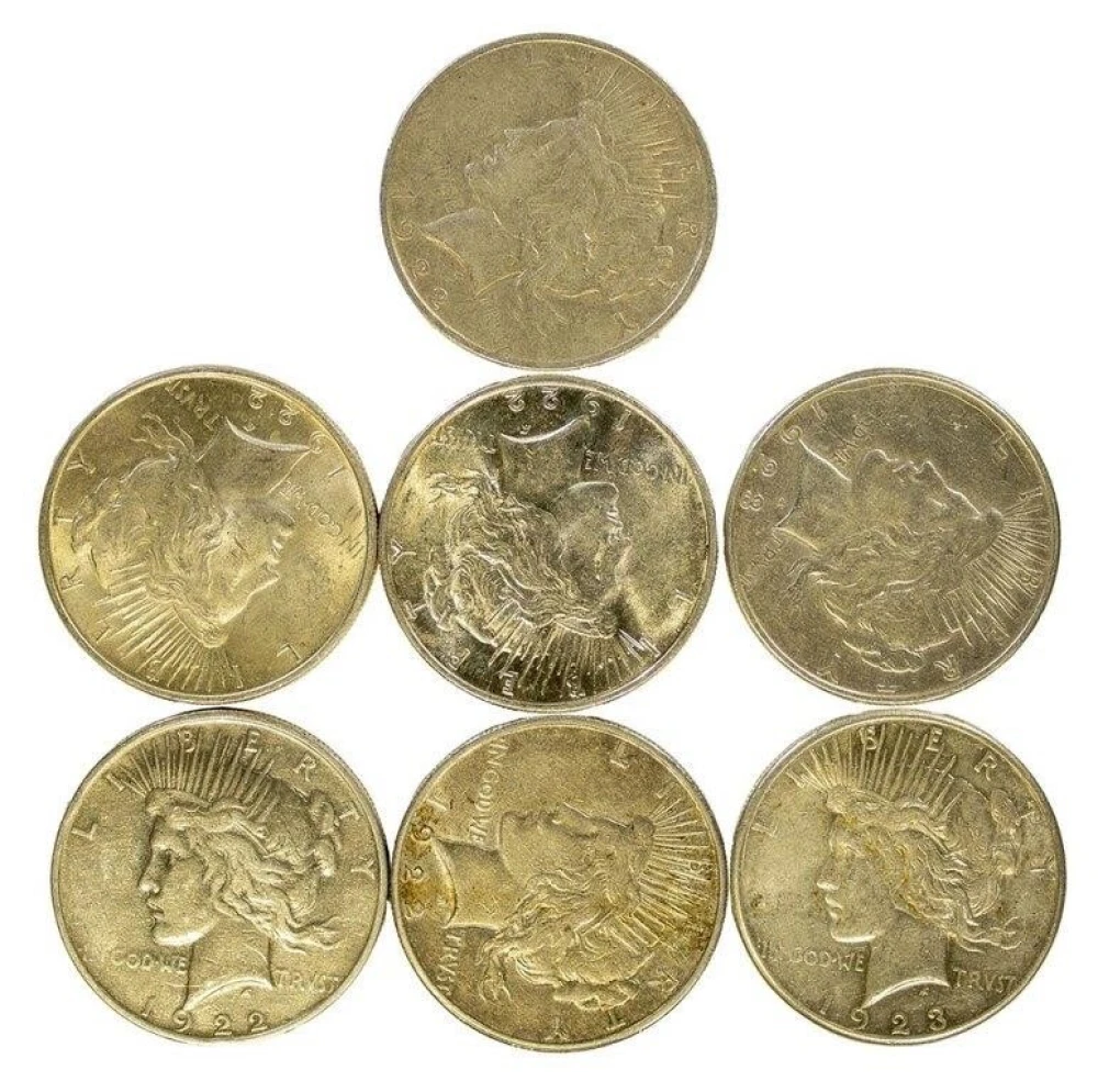 7 Circulated Mixed Peace Dollars