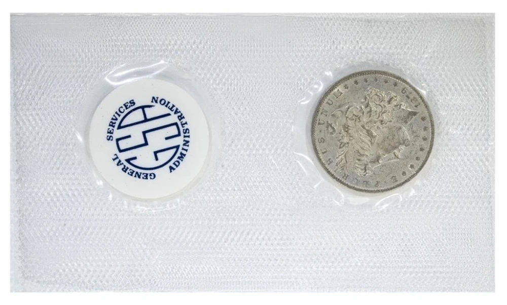 AU 1879-O GSA Morgan Dollar