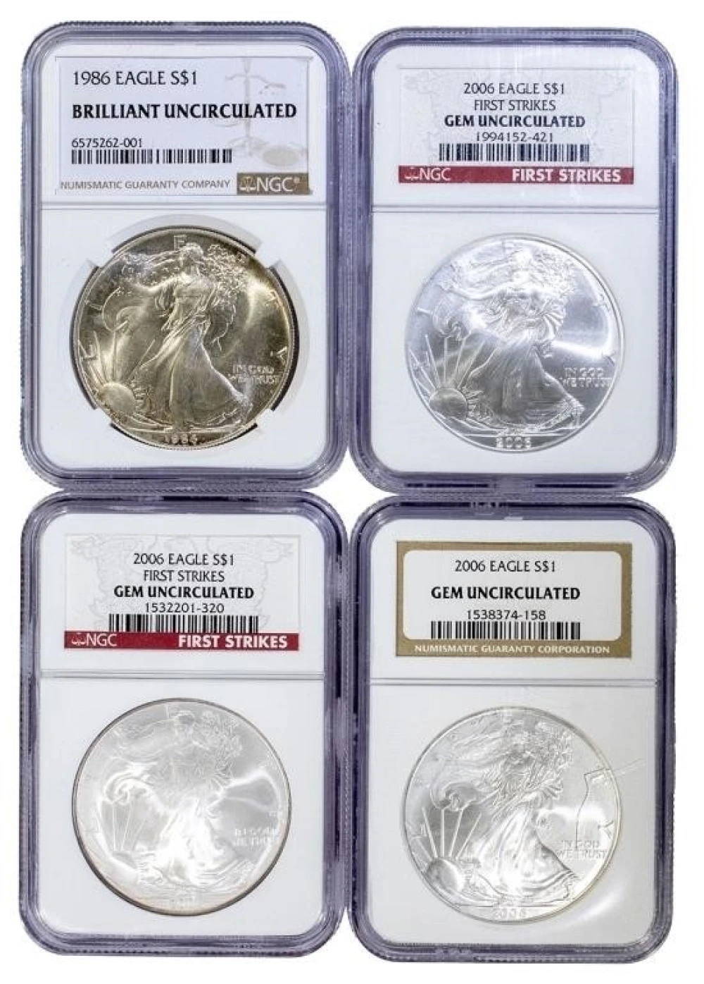 Four NGC Uncirculated Silver Eagles