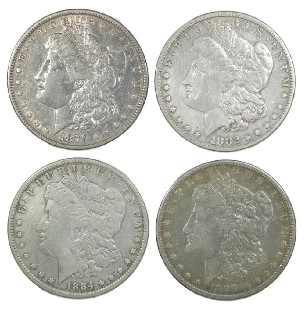 Four Lightly Cleaned Morgan Dollars