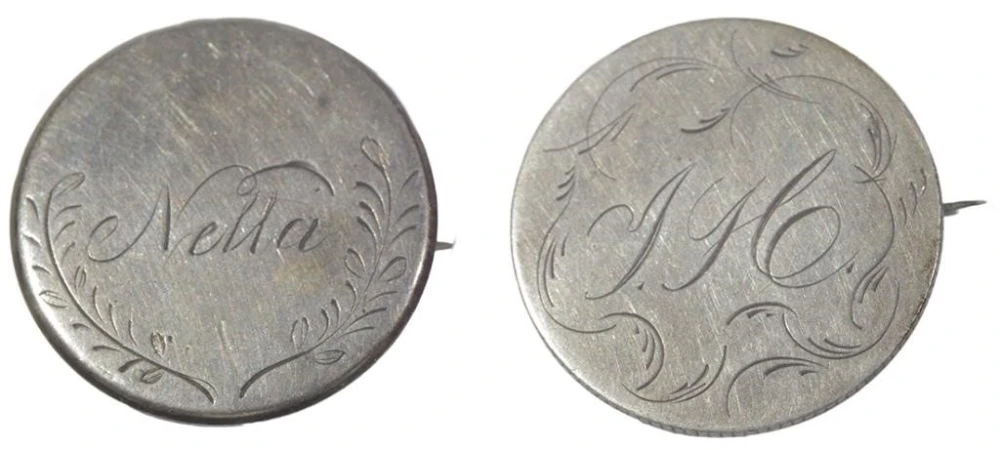 Pair of Seated Quarter Love Token Pinbacks