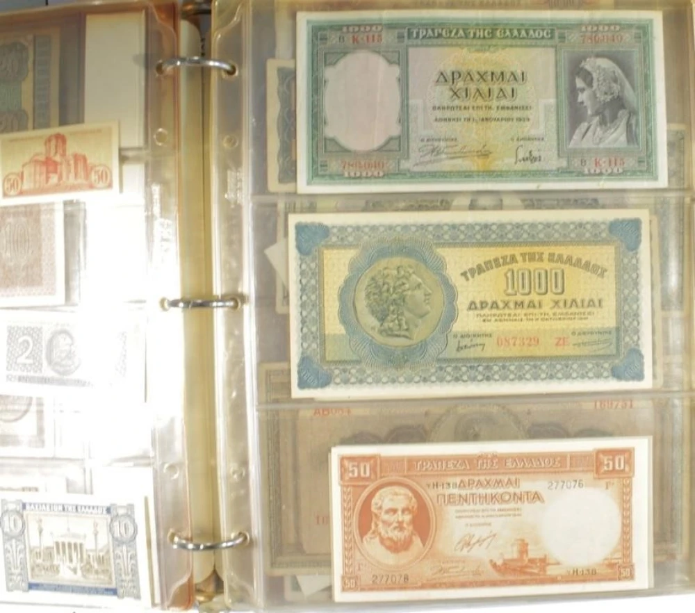 Binder of 80+ Pieces Of World Currency