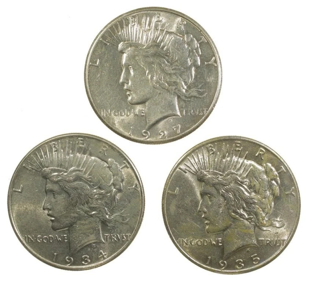 AU-50 and Better Peace Dollar Threesome