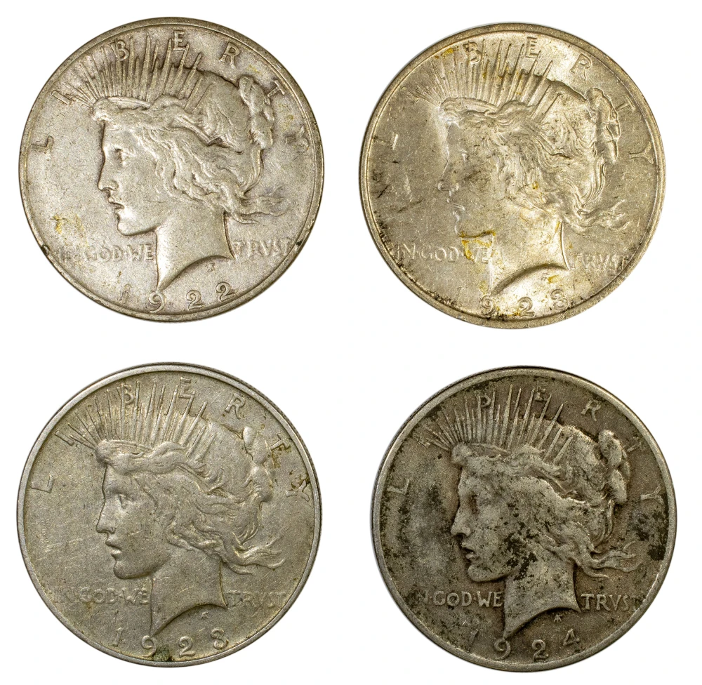Quartet of VF to AU Peace Dollars