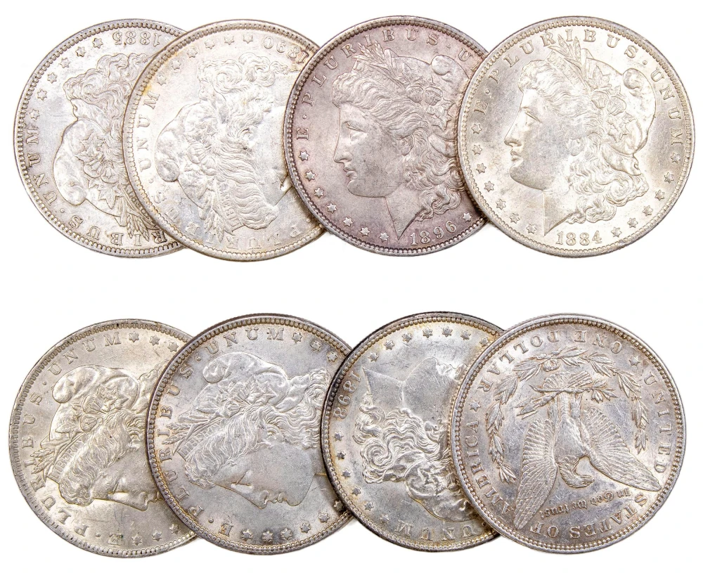 8 AU Pre-21 Morgan Dollars